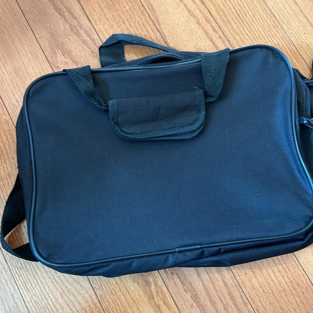 Black Protege Laptop bag with front zipper pocket 15 x 10 x 6